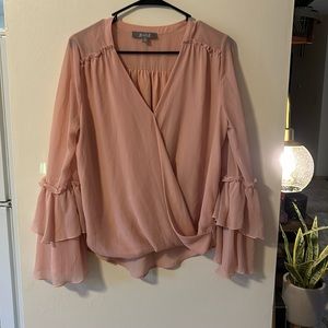 Pink woman’s long sleeve top